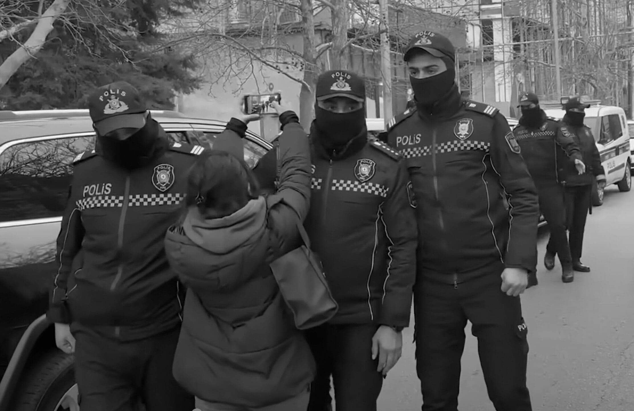 Our now detained journalist, Aytaj Tapdig, is obstructed by police from filming in Baku.